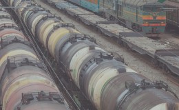 Railroad scene with locomotive and cargo trains